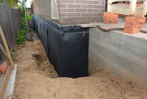 Happy homeowners after waterproofing job in Huntertown